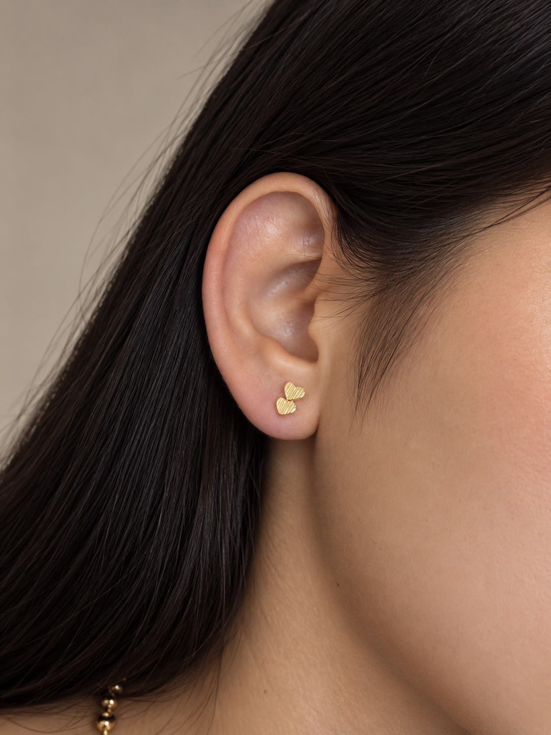 Aretes doble Corazón - Laminado en Oro 18k