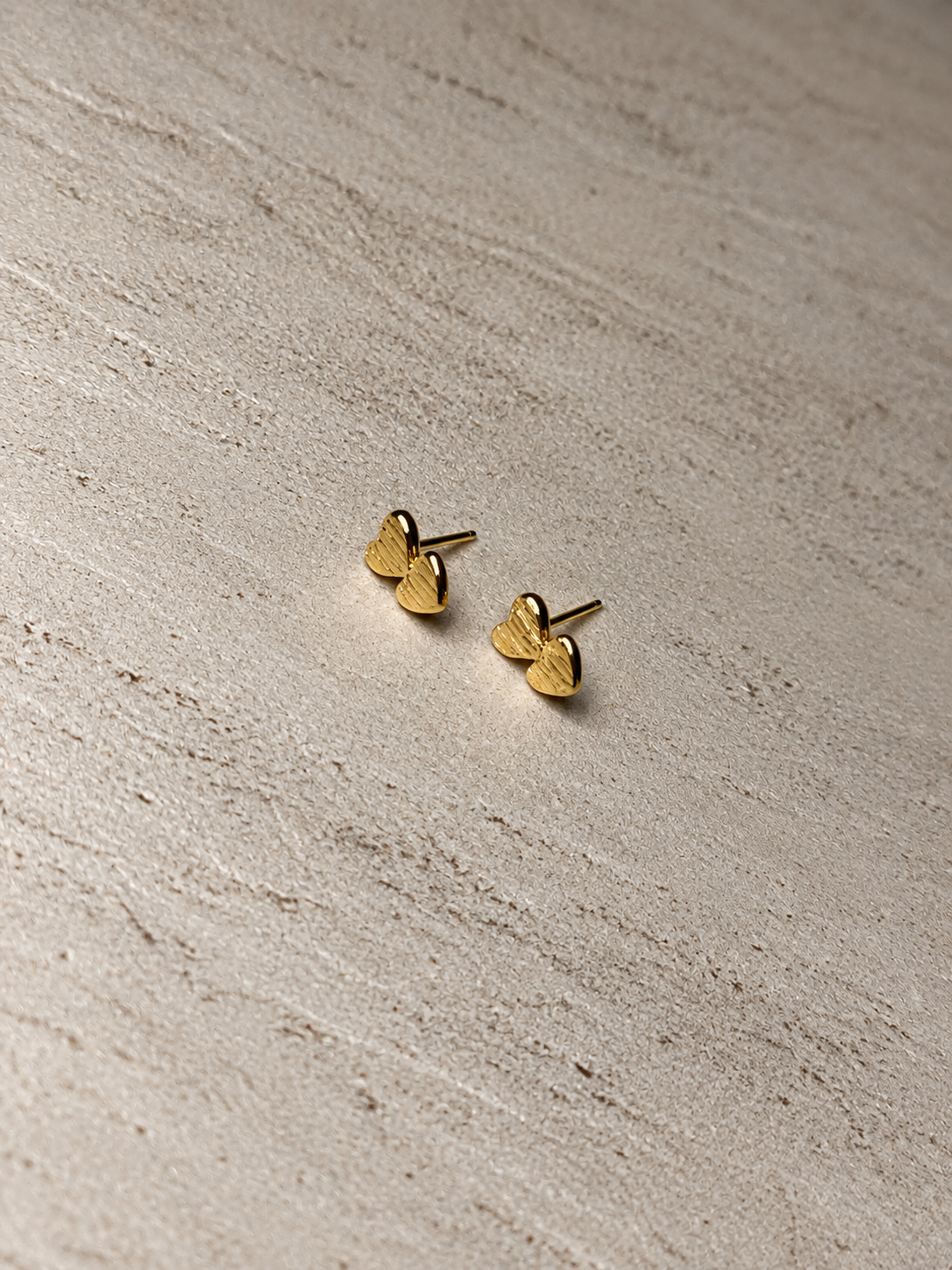 Aretes doble Corazón - Laminado en Oro 18k